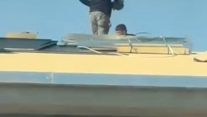 Canlarını hiçe sayarak çatıda önlem almadan çalıştılar